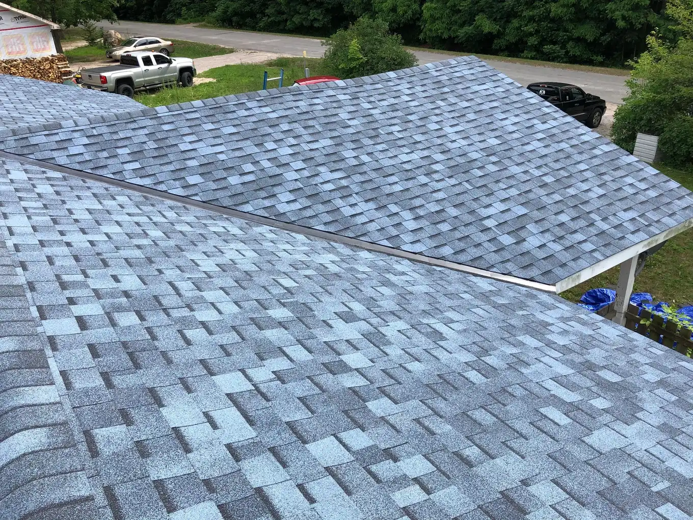Close-up of a completed Tucci Roofing shingle roof